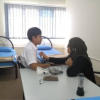 A sick room with an in-house health personnel available